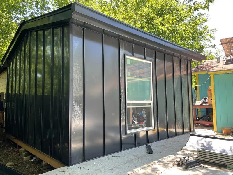 Black standing seam metal wall panels for Roof Inspection in Aransas Pass